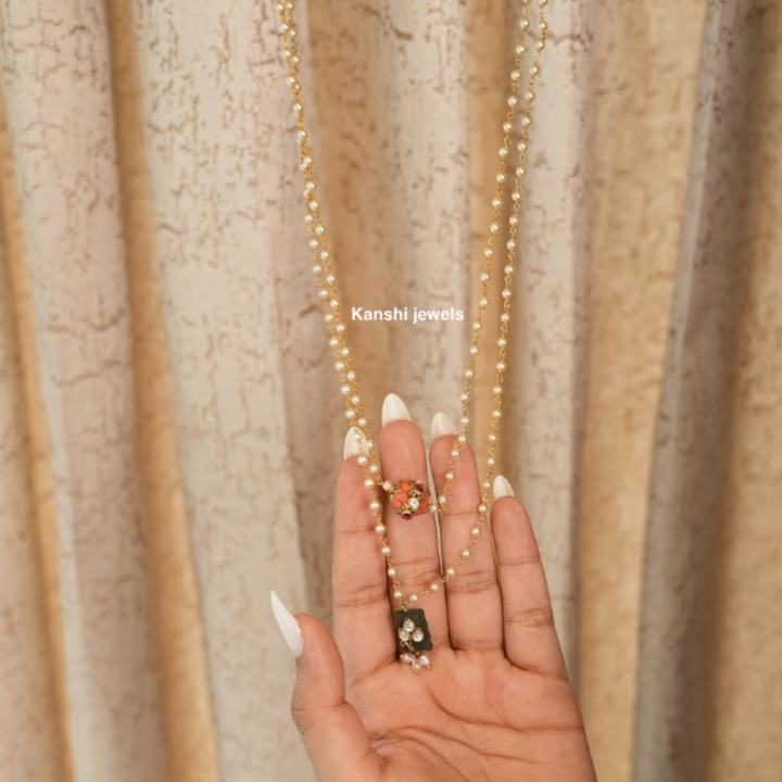 Most elegant coral jadau work with emerald jadau pearl chain necklace