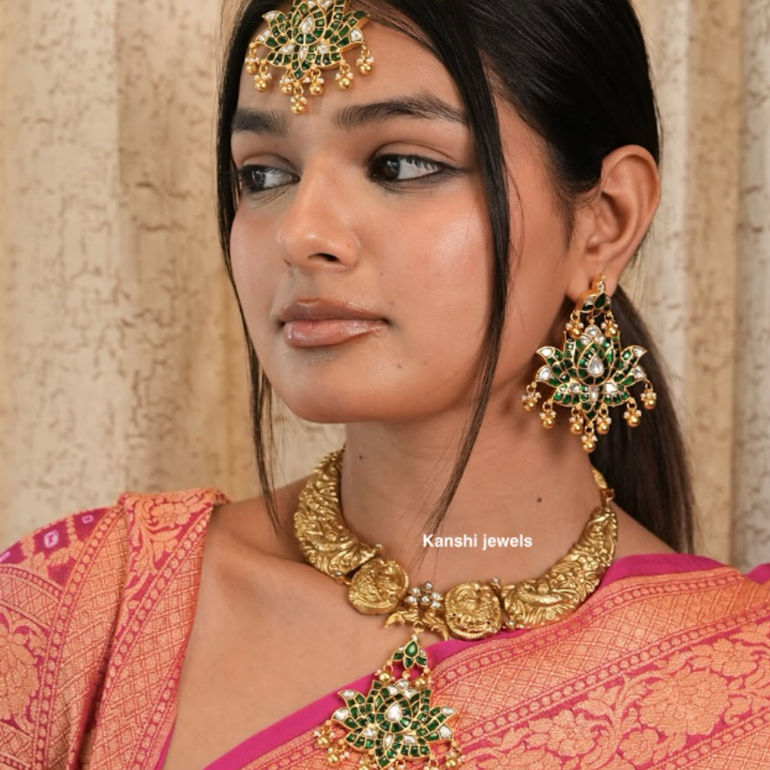 Gold look emerald look nakashi hasli necklace tika earring rani set