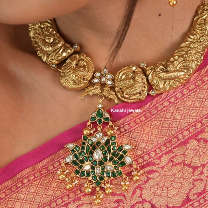 Gold look emerald look nakashi hasli necklace tika earring rani set