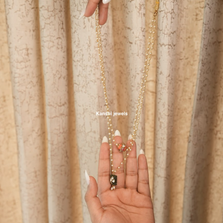 Most elegant coral jadau work with emerald jadau pearl chain necklace