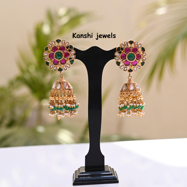 Jadau Kundan earrings by Kanshi Jewels,
Dulhan Kundan earrings,
Traditional Jadau earrings design,
Handcrafted Kundan earrings set,
Gold Jadau earrings for wedding,
Jadau Kundan earrings,
Kundan jhumka earrings,
