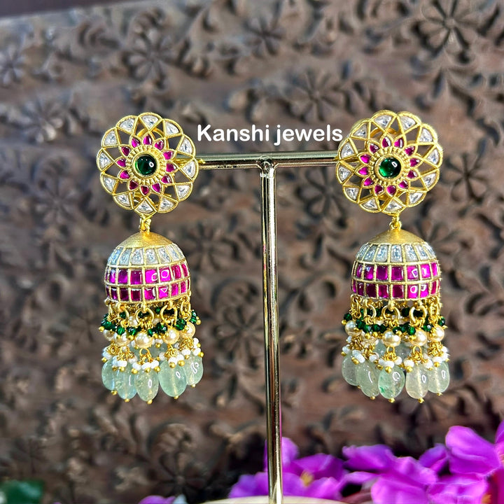 Jadau Kundan earrings by Kanshi Jewels,
Dulhan Kundan earrings,
Traditional Jadau earrings design,
Handcrafted Kundan earrings set,
Gold Jadau earrings for wedding,
Jadau Kundan earrings,
Kundan jhumka earrings,
