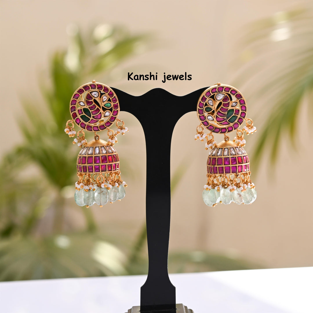 Jadau Kundan earrings by Kanshi Jewels,
Dulhan Kundan earrings,
Traditional Jadau earrings design,
Handcrafted Kundan earrings set,
Gold Jadau earrings for wedding,
Jadau Kundan earrings,
Kundan jhumka earrings,
