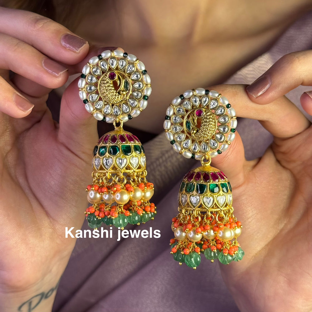 Jadau Kundan earrings by Kanshi Jewels,
Dulhan Kundan earrings,
Traditional Jadau earrings design,
Handcrafted Kundan earrings set,
Gold Jadau earrings for wedding,
Jadau Kundan earrings,
Kundan jhumka earrings,
