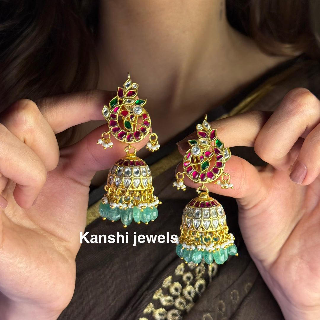 Jadau Kundan earrings by Kanshi Jewels,
Dulhan Kundan earrings,
Traditional Jadau earrings design,
Handcrafted Kundan earrings set,
Gold Jadau earrings for wedding,
Jadau Kundan earrings,
Kundan jhumka earrings,
