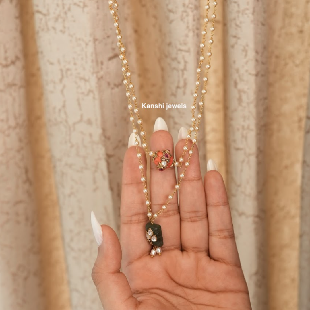 Most elegant coral jadau work with emerald jadau pearl chain necklace