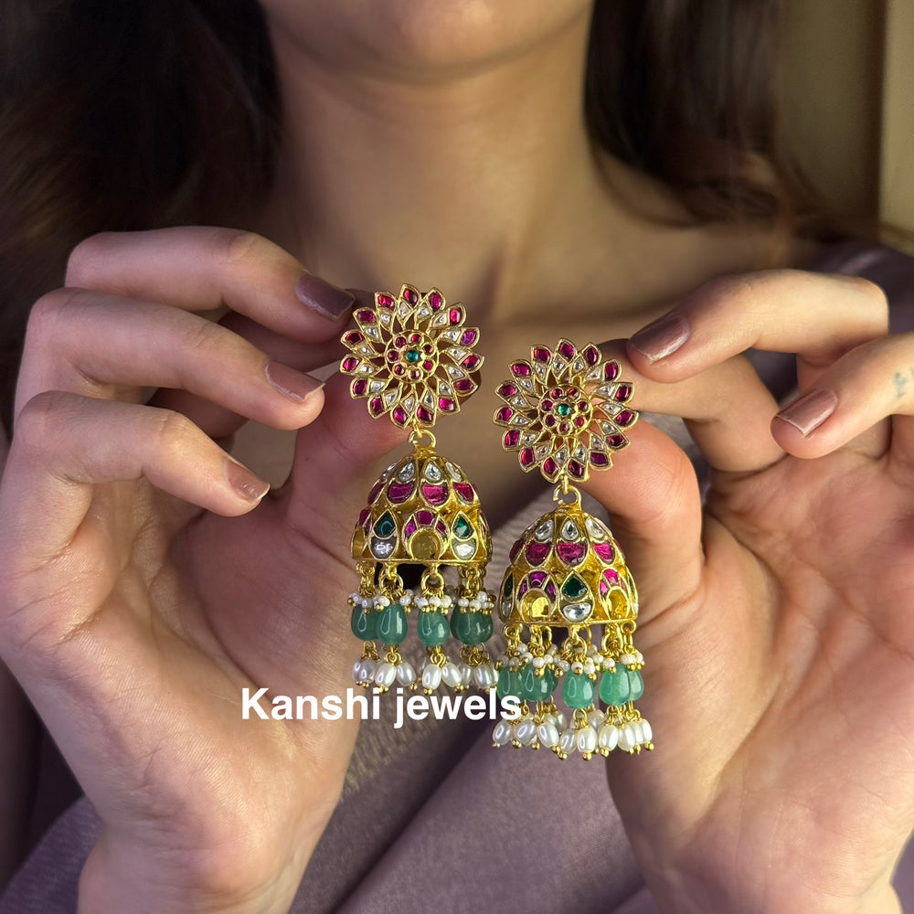 Jadau Kundan earrings by Kanshi Jewels,
Dulhan Kundan earrings,
Traditional Jadau earrings design,
Handcrafted Kundan earrings set,
Gold Jadau earrings for wedding,
Jadau Kundan earrings,
Kundan jhumka earrings,
