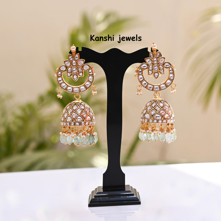 Jadau Kundan earrings by Kanshi Jewels,
Dulhan Kundan earrings,
Traditional Jadau earrings design,
Handcrafted Kundan earrings set,
Gold Jadau earrings for wedding,
Jadau Kundan earrings,
Kundan jhumka earrings,

