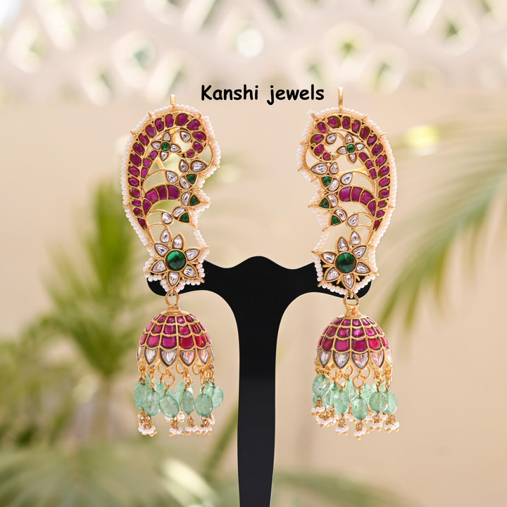 Jadau Kundan earrings by Kanshi Jewels,
Dulhan Kundan earrings,
Traditional Jadau earrings design,
Handcrafted Kundan earrings set,
Gold Jadau earrings for wedding,
Jadau Kundan earrings,
Kundan jhumka earrings,
