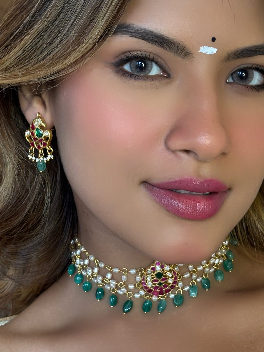 Elegant Jadau motive pearl peacock fusion set