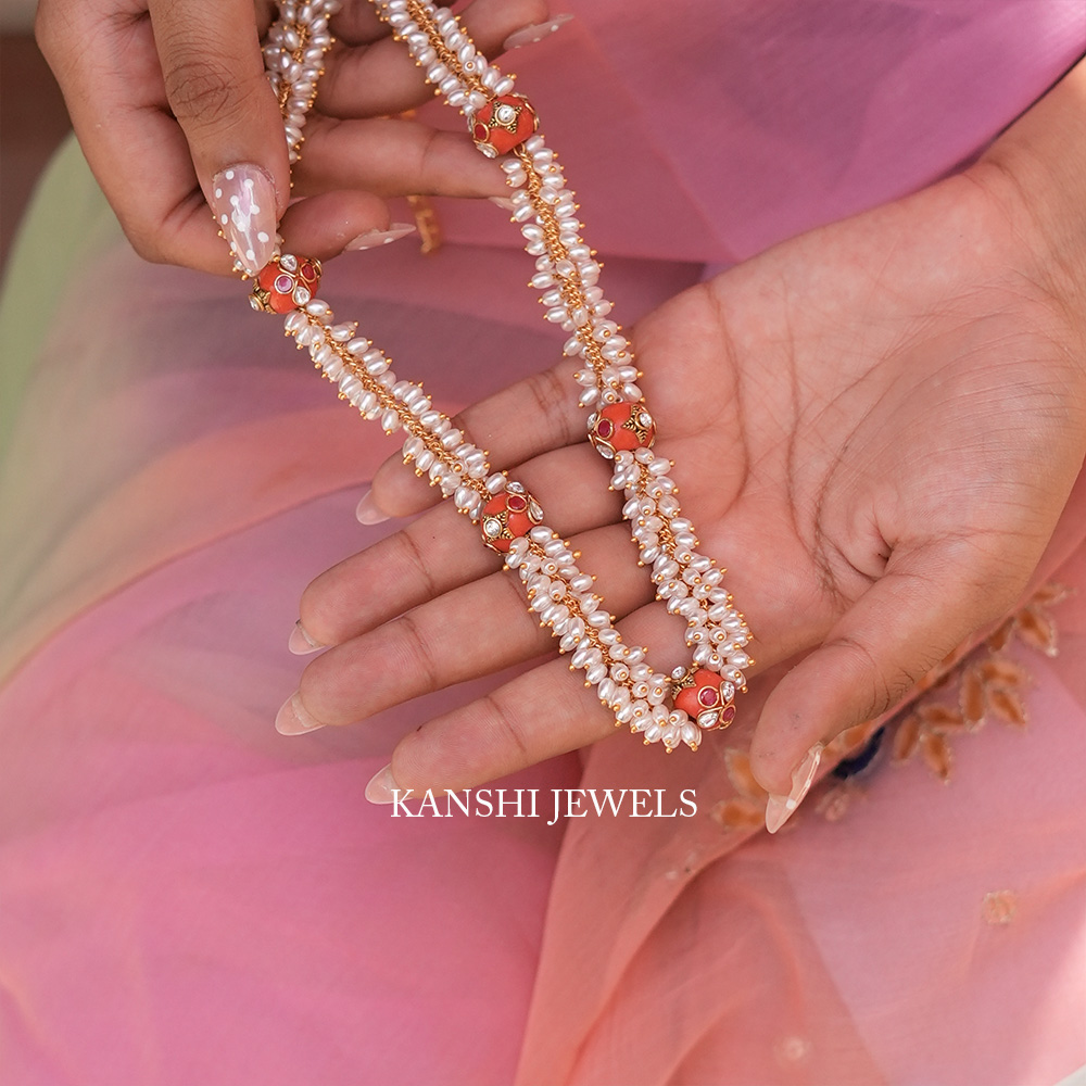 Elegant Rice Pearls Intricate Kundan Work Coral Accents