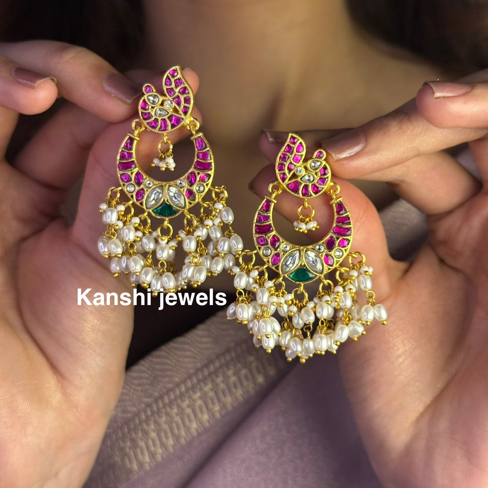 Jadau Kundan earrings by Kanshi Jewels,
Dulhan Kundan earrings,
Traditional Jadau earrings design,
Handcrafted Kundan earrings set,
Gold Jadau earrings for wedding,
Jadau Kundan earrings,
Kundan jhumka earrings,
