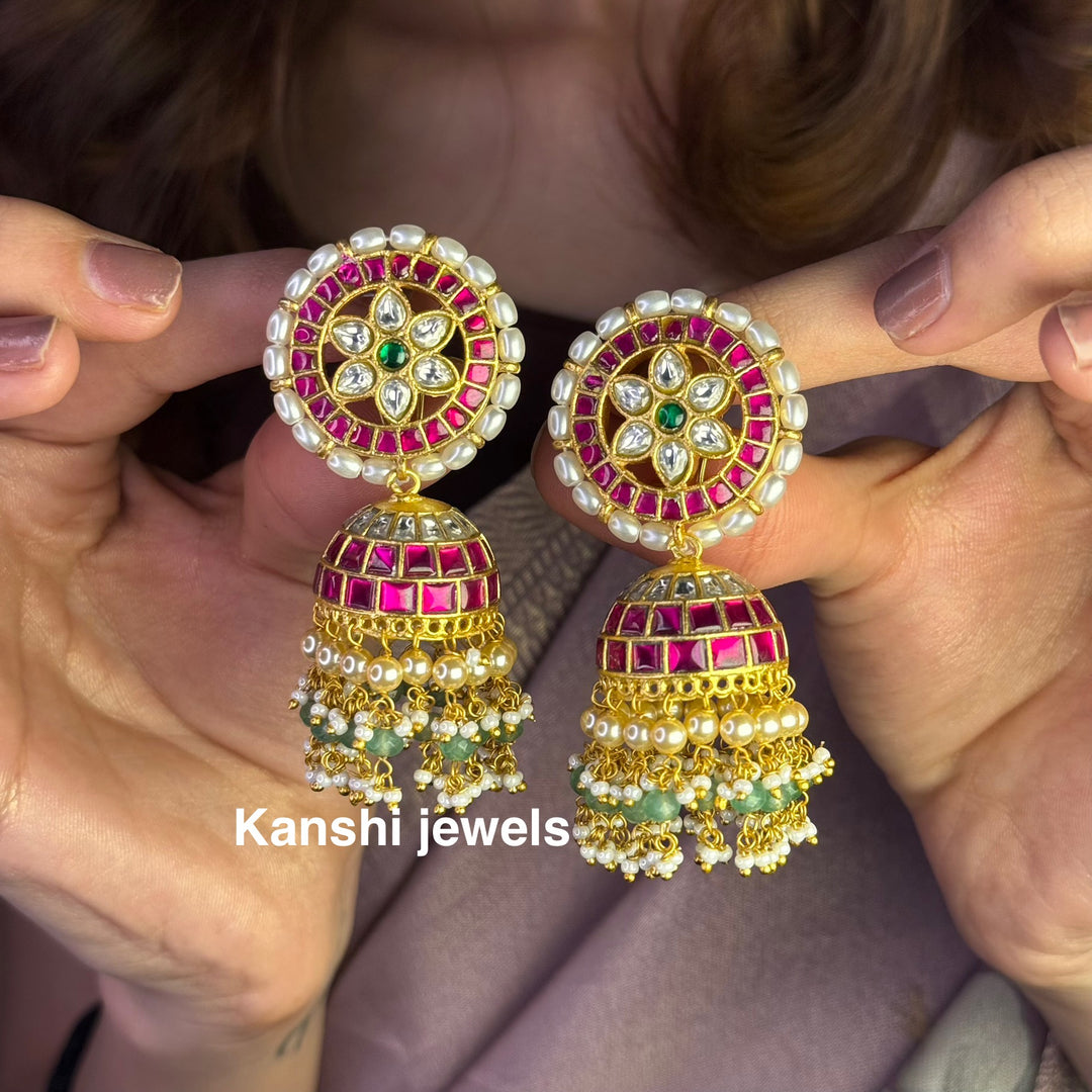 Jadau Kundan earrings by Kanshi Jewels,
Dulhan Kundan earrings,
Traditional Jadau earrings design,
Handcrafted Kundan earrings set,
Gold Jadau earrings for wedding,
Jadau Kundan earrings,
Kundan jhumka earrings,

