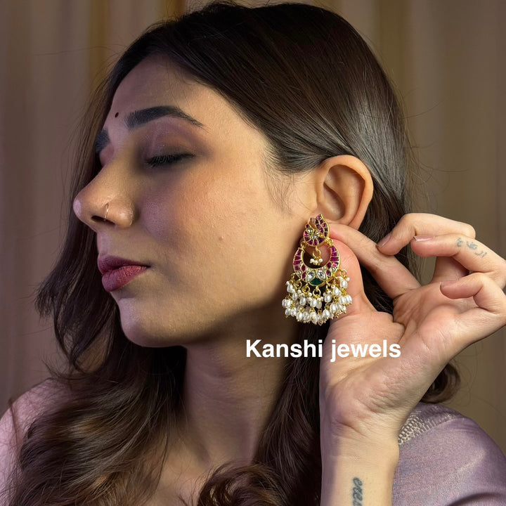 Jadau Kundan earrings by Kanshi Jewels,
Dulhan Kundan earrings,
Traditional Jadau earrings design,
Handcrafted Kundan earrings set,
Gold Jadau earrings for wedding,
Jadau Kundan earrings,
Kundan jhumka earrings,
