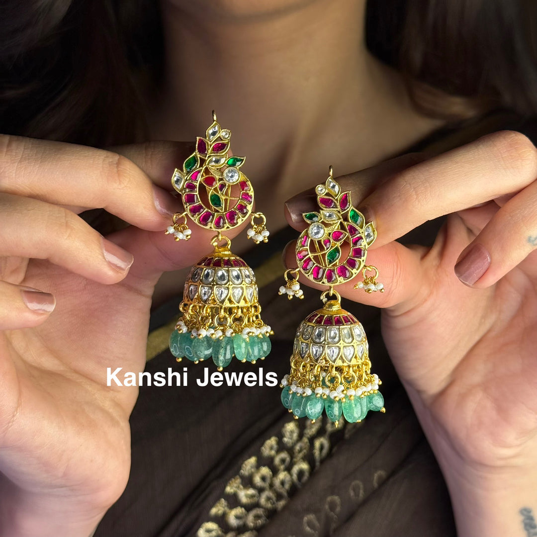 Jadau Kundan earrings by Kanshi Jewels,
Dulhan Kundan earrings,
Traditional Jadau earrings design,
Handcrafted Kundan earrings set,
Gold Jadau earrings for wedding,
Jadau Kundan earrings,
Kundan jhumka earrings,
