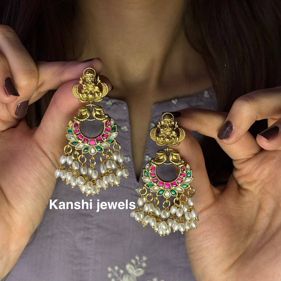 Jadau Kundan earrings by Kanshi Jewels,
Dulhan Kundan earrings,
Traditional Jadau earrings design,
Handcrafted Kundan earrings set,
Gold Jadau earrings for wedding,
Jadau Kundan earrings,
Kundan jhumka earrings,
