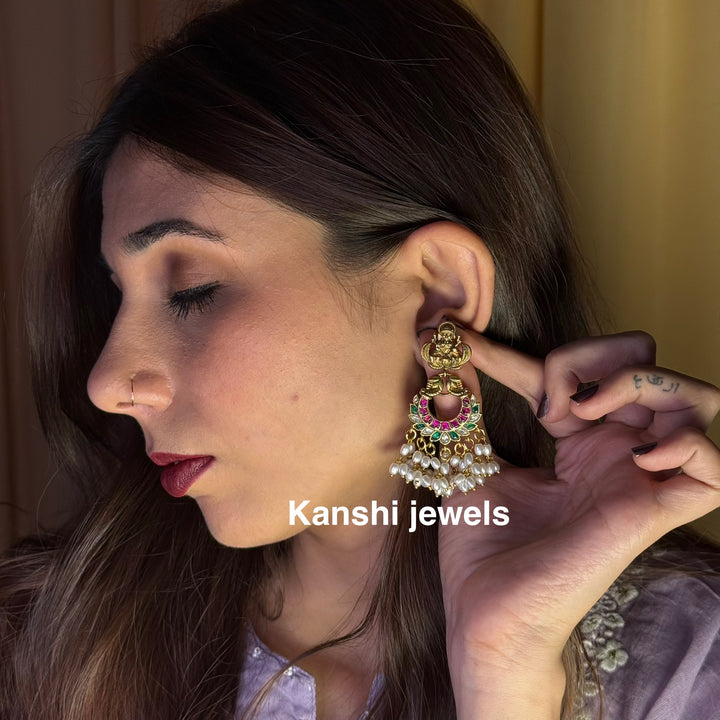 Jadau Kundan earrings by Kanshi Jewels,
Dulhan Kundan earrings,
Traditional Jadau earrings design,
Handcrafted Kundan earrings set,
Gold Jadau earrings for wedding,
Jadau Kundan earrings,
Kundan jhumka earrings,

