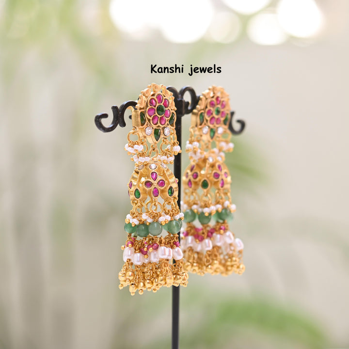 Jadau Kundan earrings by Kanshi Jewels,
Dulhan Kundan earrings,
Traditional Jadau earrings design,
Handcrafted Kundan earrings set,
Gold Jadau earrings for wedding,
Jadau Kundan earrings,
Kundan jhumka earrings,
