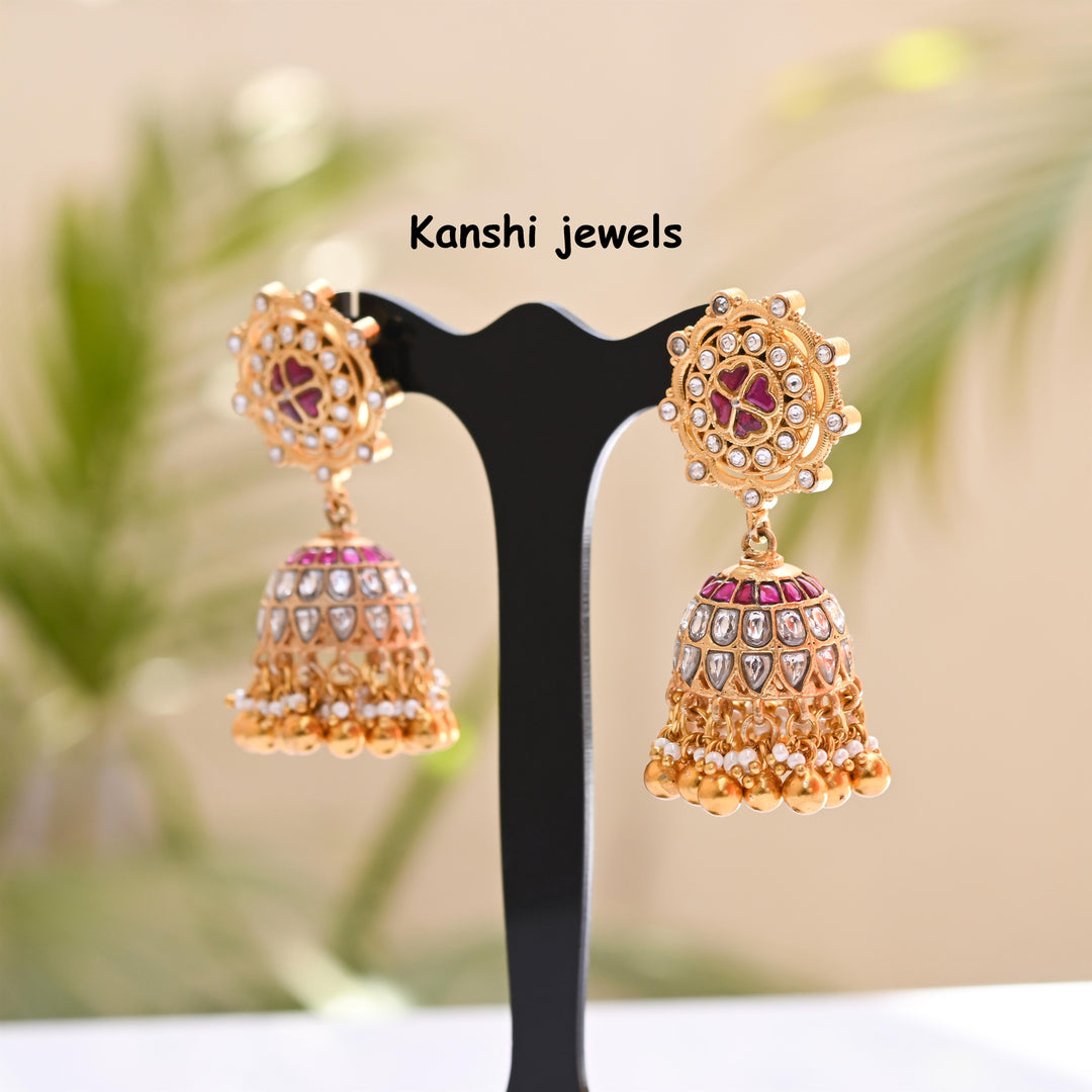 Jadau Kundan earrings by Kanshi Jewels,
Dulhan Kundan earrings,
Traditional Jadau earrings design,
Handcrafted Kundan earrings set,
Gold Jadau earrings for wedding,
Jadau Kundan earrings,
Kundan jhumka earrings,
