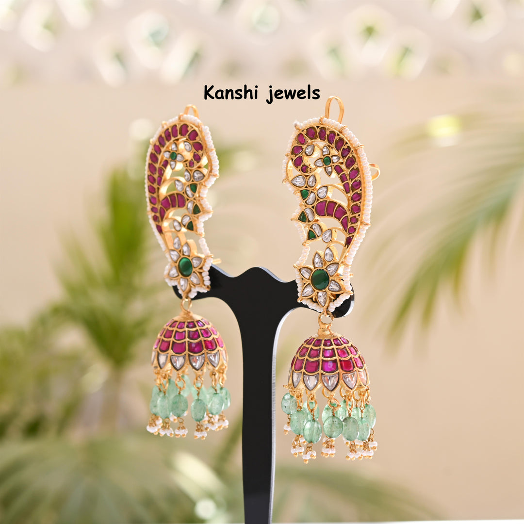 Jadau Kundan earrings by Kanshi Jewels,
Dulhan Kundan earrings,
Traditional Jadau earrings design,
Handcrafted Kundan earrings set,
Gold Jadau earrings for wedding,
Jadau Kundan earrings,
Kundan jhumka earrings,