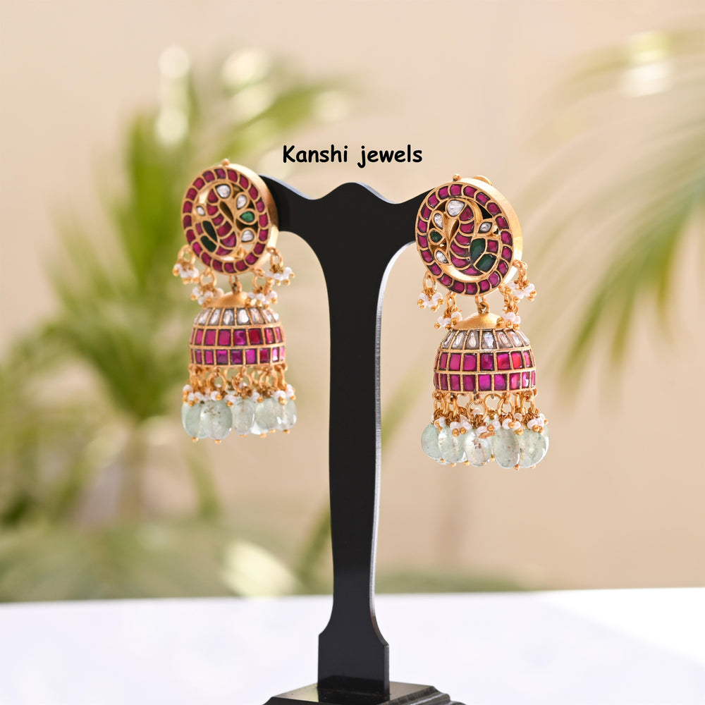 Jadau Kundan earrings by Kanshi Jewels,
Dulhan Kundan earrings,
Traditional Jadau earrings design,
Handcrafted Kundan earrings set,
Gold Jadau earrings for wedding,
Jadau Kundan earrings,
Kundan jhumka earrings,
