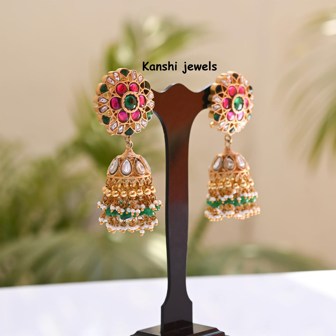 Jadau Kundan earrings by Kanshi Jewels,
Dulhan Kundan earrings,
Traditional Jadau earrings design,
Handcrafted Kundan earrings set,
Gold Jadau earrings for wedding,
Jadau Kundan earrings,
Kundan jhumka earrings,
