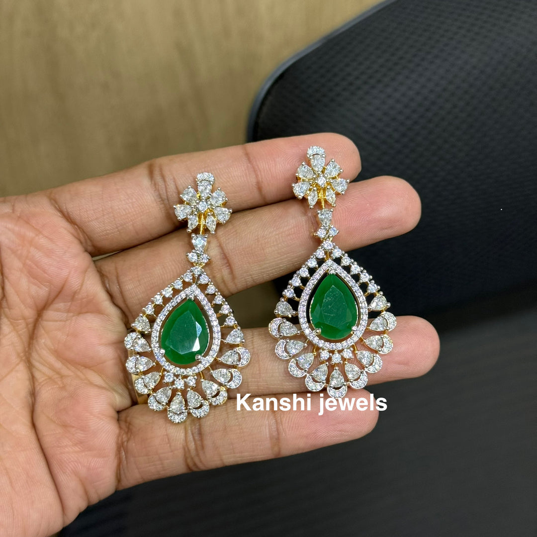Jadau Kundan earrings by Kanshi Jewels,
Dulhan Kundan earrings,
Traditional Jadau earrings design,
Handcrafted Kundan earrings set,
Gold Jadau earrings for wedding,
Jadau Kundan earrings,
Kundan jhumka earrings,
