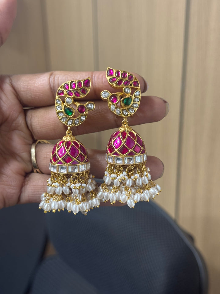 Jadau Kundan earrings by Kanshi Jewels,
Dulhan Kundan earrings,
Traditional Jadau earrings design,
Handcrafted Kundan earrings set,
Gold Jadau earrings for wedding,
Jadau Kundan earrings,
Kundan jhumka earrings,
