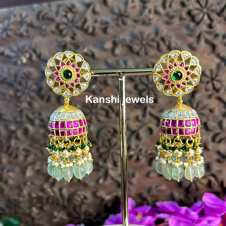 Jadau Kundan earrings by Kanshi Jewels,
Dulhan Kundan earrings,
Traditional Jadau earrings design,
Handcrafted Kundan earrings set,
Gold Jadau earrings for wedding,
Jadau Kundan earrings,
Kundan jhumka earrings,
