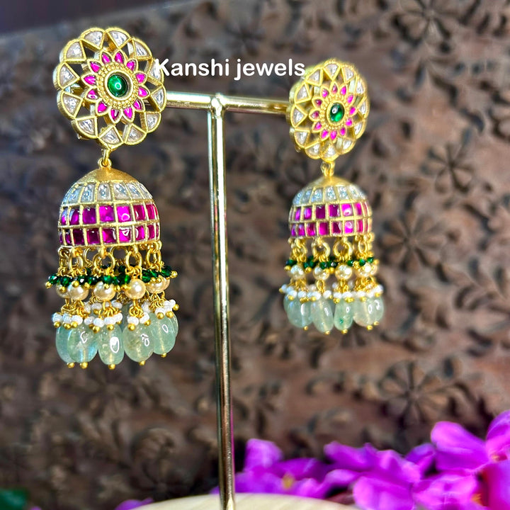 Jadau Kundan earrings by Kanshi Jewels,
Dulhan Kundan earrings,
Traditional Jadau earrings design,
Handcrafted Kundan earrings set,
Gold Jadau earrings for wedding,
Jadau Kundan earrings,
Kundan jhumka earrings,
