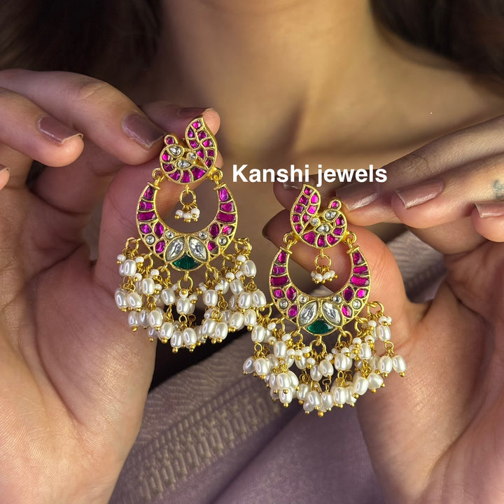 Jadau Kundan earrings by Kanshi Jewels,
Dulhan Kundan earrings,
Traditional Jadau earrings design,
Handcrafted Kundan earrings set,
Gold Jadau earrings for wedding,
Jadau Kundan earrings,
Kundan jhumka earrings,
