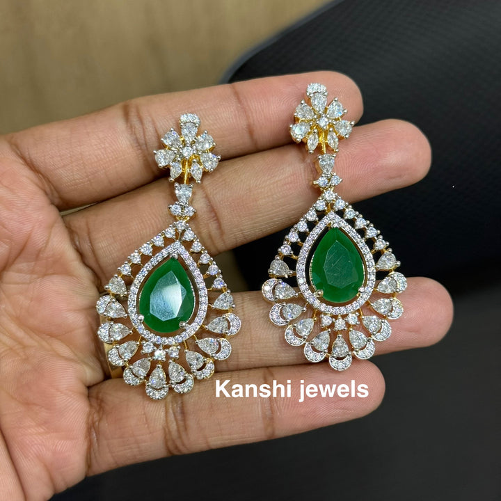 Jadau Kundan earrings by Kanshi Jewels,
Dulhan Kundan earrings,
Traditional Jadau earrings design,
Handcrafted Kundan earrings set,
Gold Jadau earrings for wedding,
Jadau Kundan earrings,
Kundan jhumka earrings,
