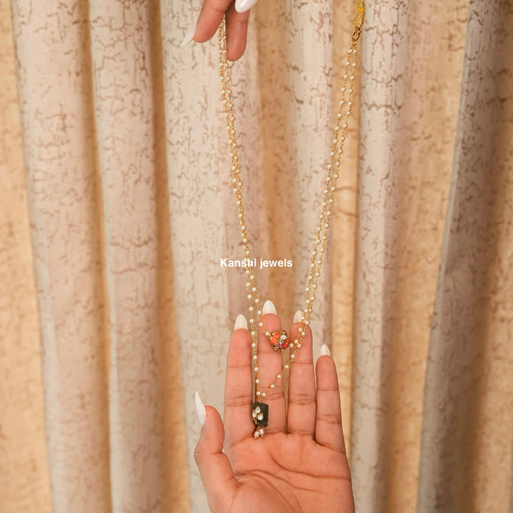 Most elegant coral jadau work with emerald jadau pearl chain necklace