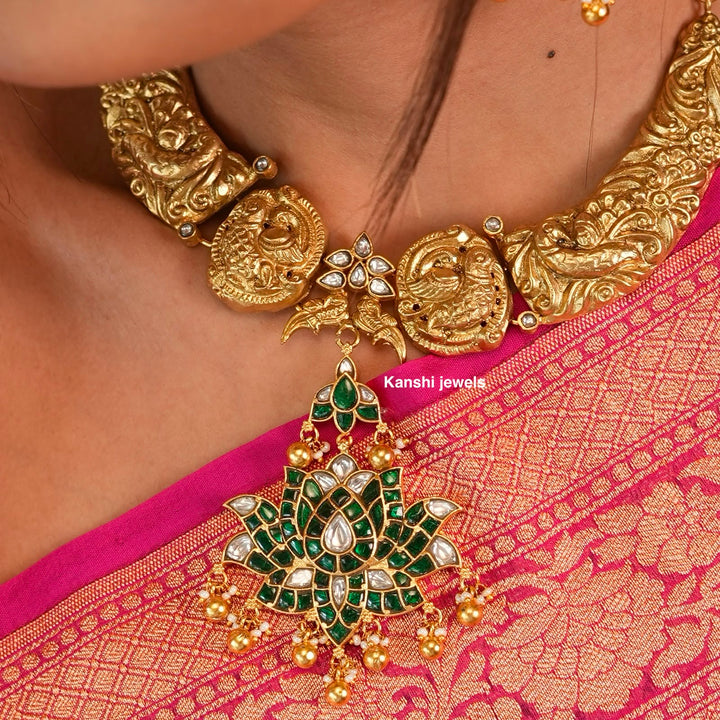 Gold look emerald look nakashi hasli necklace tika earring rani set