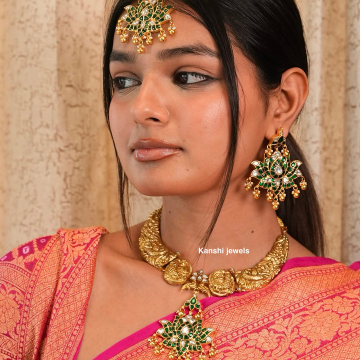 Gold look emerald look nakashi hasli necklace tika earring rani set