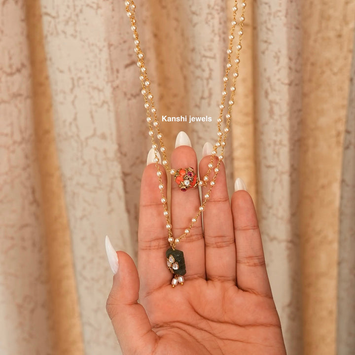 Most elegant coral jadau work with emerald jadau pearl chain necklace